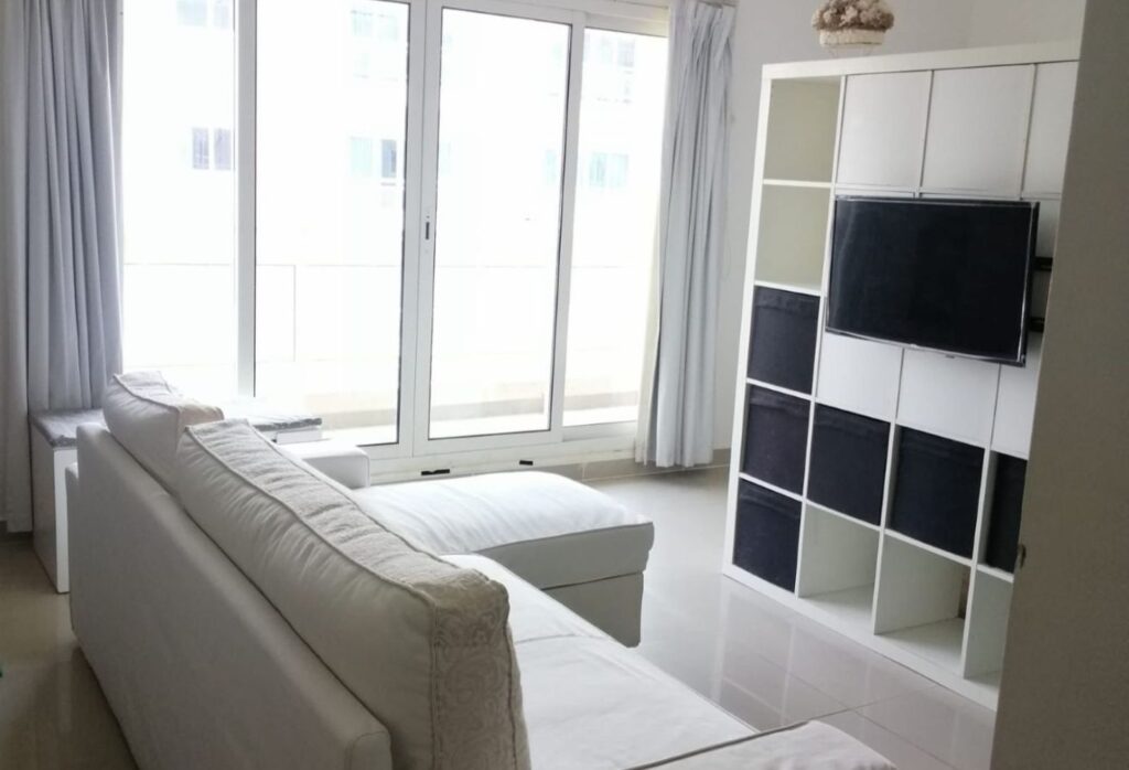 Affordable studio apartment for sale in Tower 21 Al Reef Downtown Abu Dhabi with balcony, parking, and shared poo