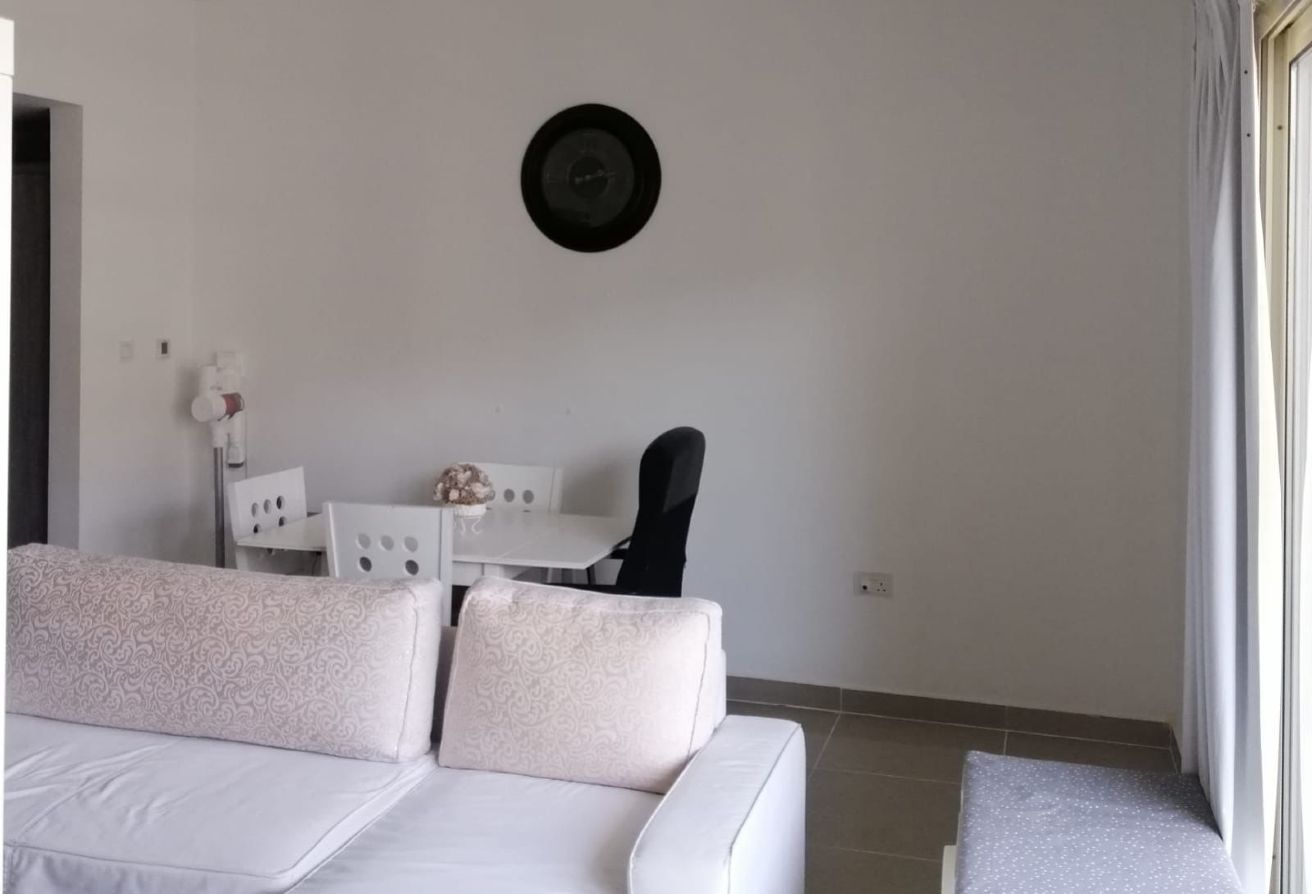Studio apartment for sale in Tower 21 Al Reef Downtown Abu Dhabi with balcony, rented until 2025, strong ROI investment