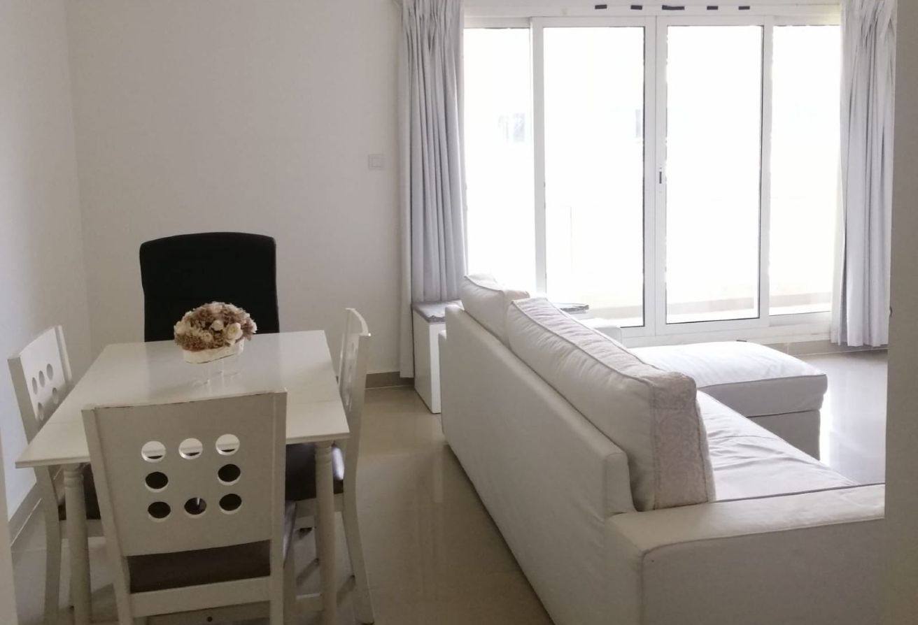 Studio apartment for sale in Tower 21 Al Reef Downtown Abu Dhabi with balcony, rented until 2025, strong ROI investment