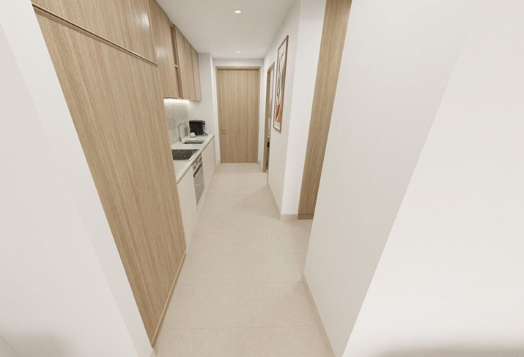 Top-floor studio apartment for sale in Gardenia Bay Yas Island Abu Dhabi with balcony street view, modern layout, and strong ROI investment.