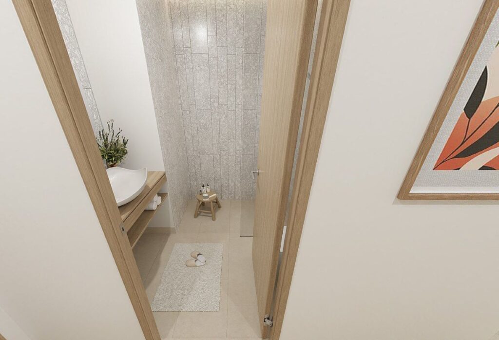 Top-floor studio apartment for sale in Gardenia Bay Yas Island Abu Dhabi with balcony street view, modern layout, and strong ROI investment.