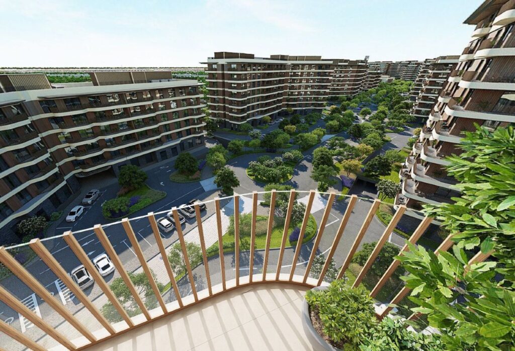 Top-floor studio apartment for sale in Gardenia Bay Yas Island Abu Dhabi with balcony street view, modern layout, and strong ROI investment.