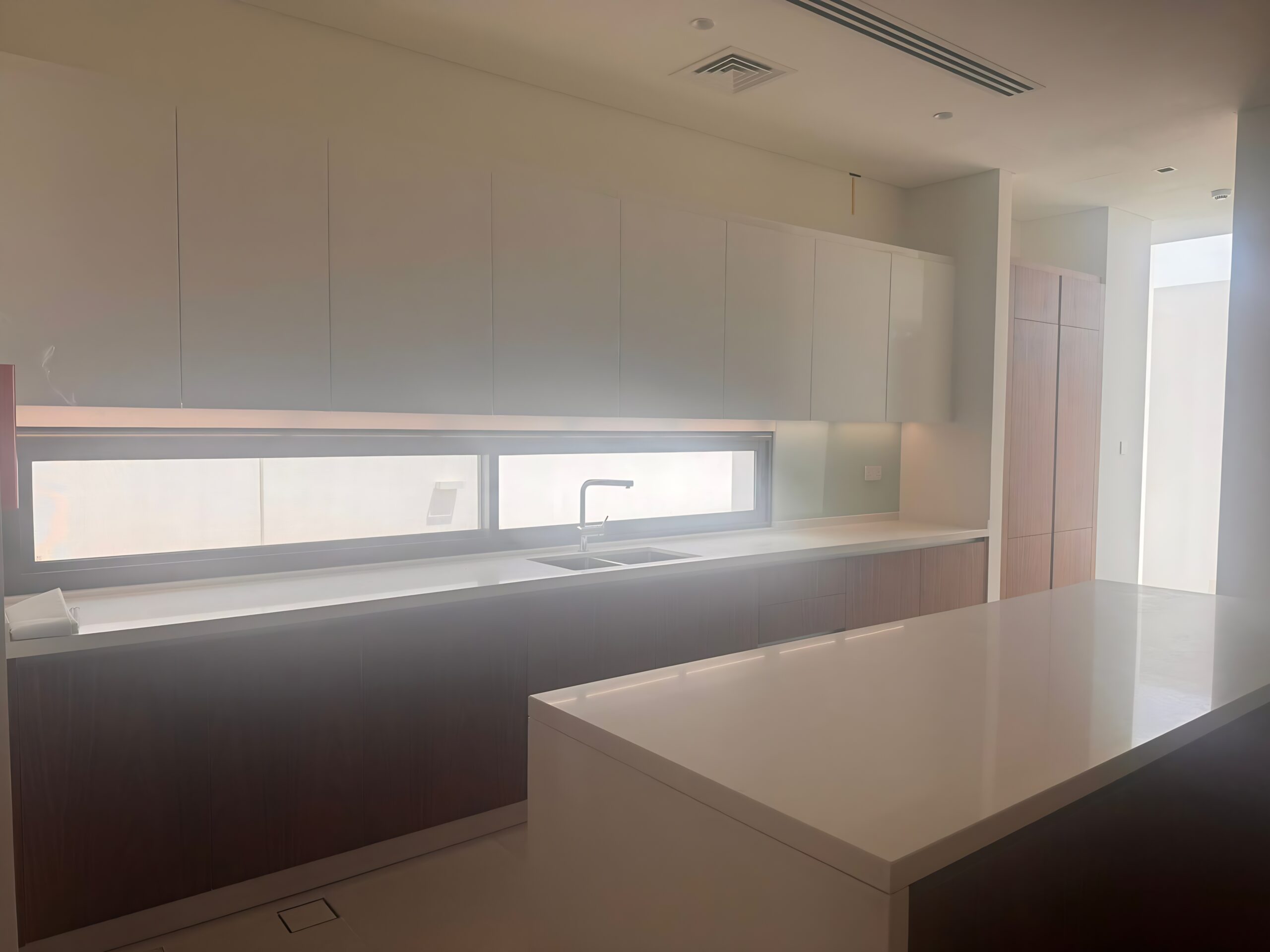Waterfront 5-bedroom villa for sale in Seef Al Jubail Abu Dhabi with modern design, balconies, and exclusive luxury community amenities
