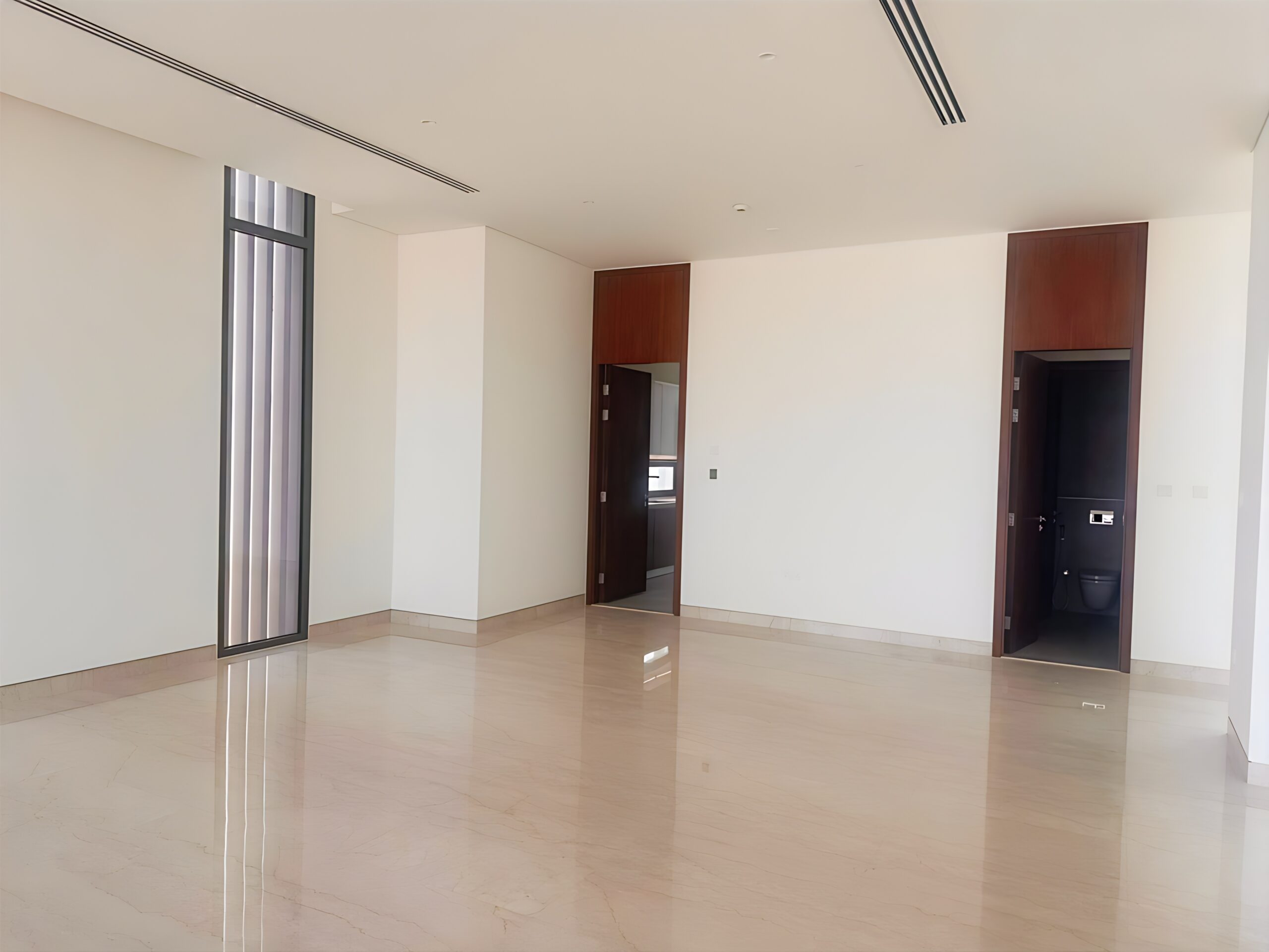 Waterfront 5-bedroom villa for sale in Seef Al Jubail Abu Dhabi with modern design, balconies, and exclusive luxury community amenities