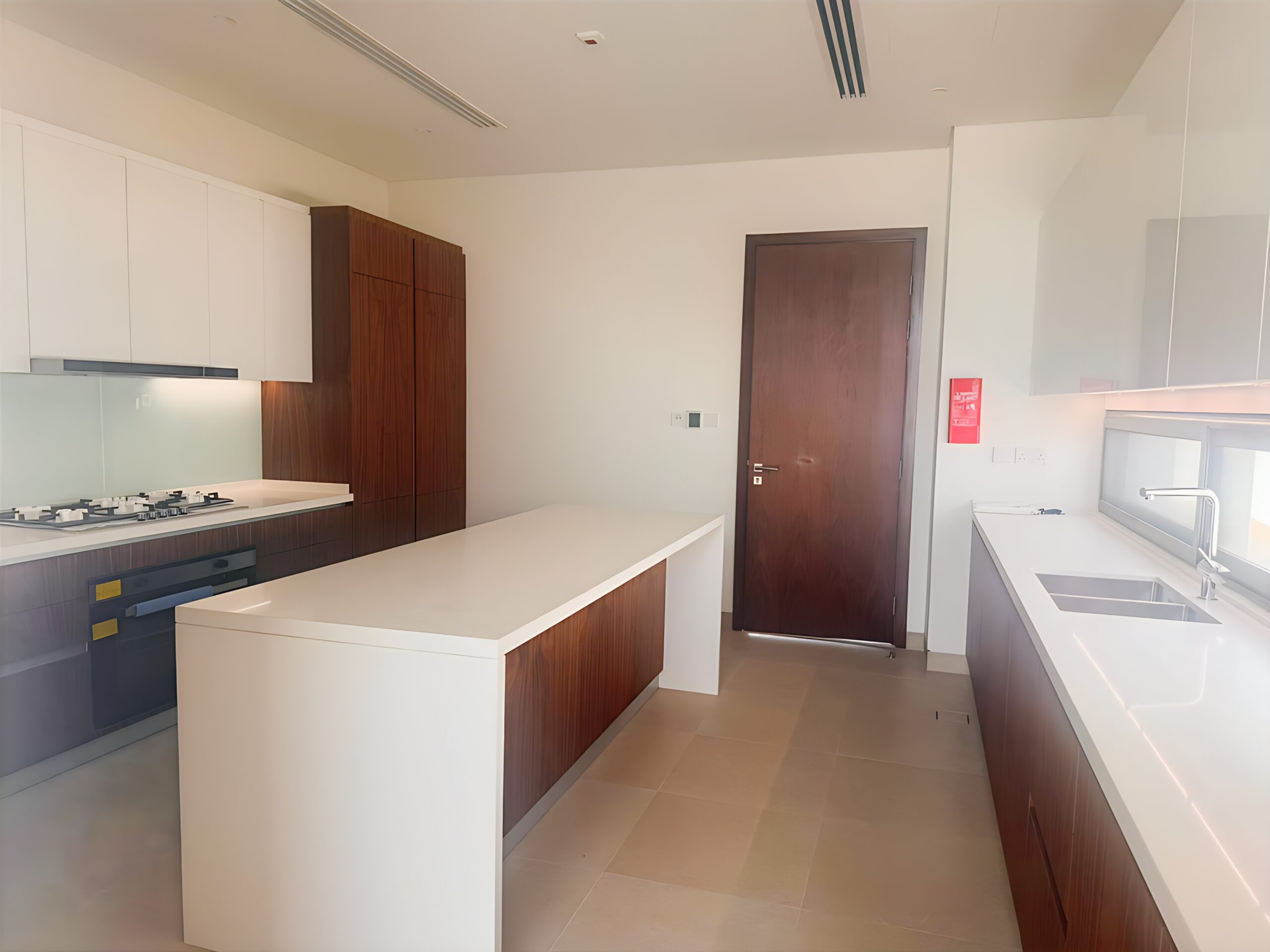 Waterfront 5-bedroom villa for sale in Seef Al Jubail Abu Dhabi with modern design, balconies, and exclusive luxury community amenities