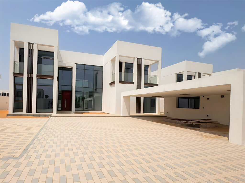Waterfront 5-bedroom villa for sale in Seef Al Jubail Abu Dhabi with modern design, balconies, and exclusive luxury community amenities