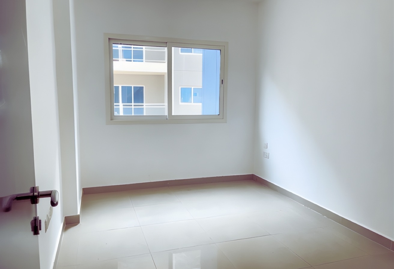 3-bedroom apartment for sale in Tower 21, Al Reef Downtown Abu Dhabi – spacious family home with maid’s room and terrace