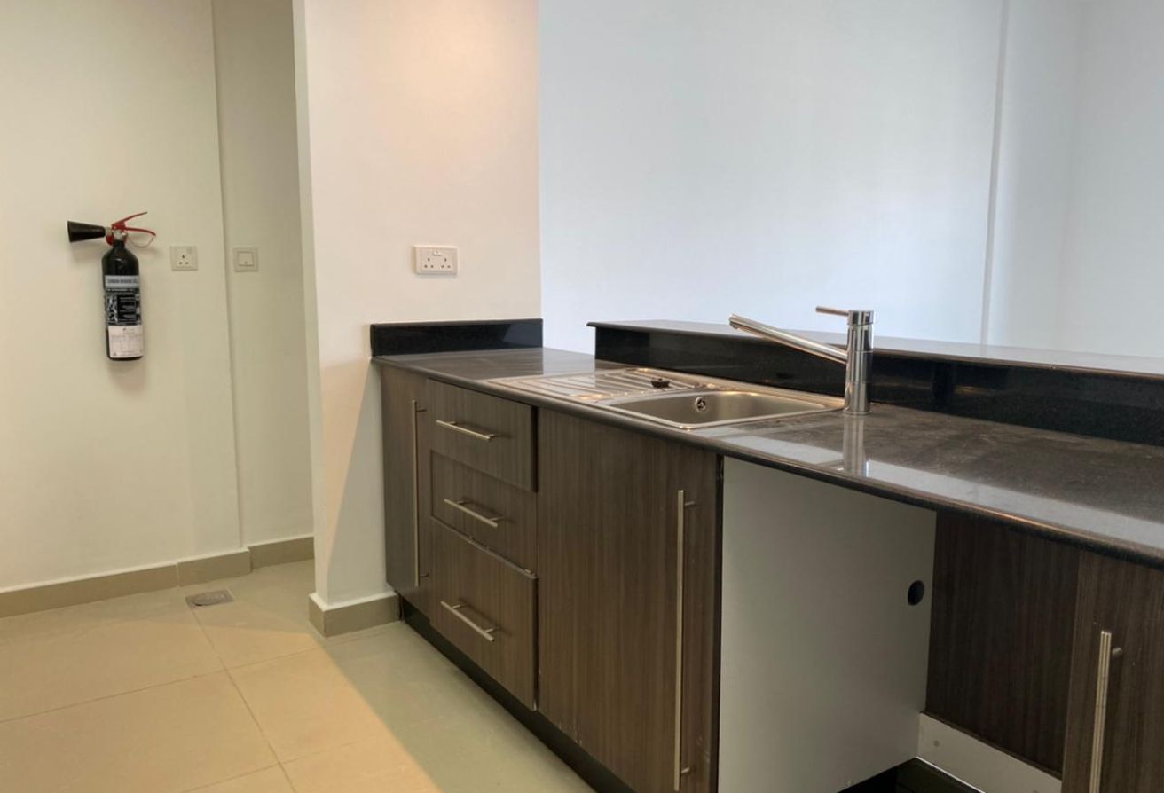 Affordable 1-bedroom apartment Tower 30 Al Reef Downtown Abu Dhabi.