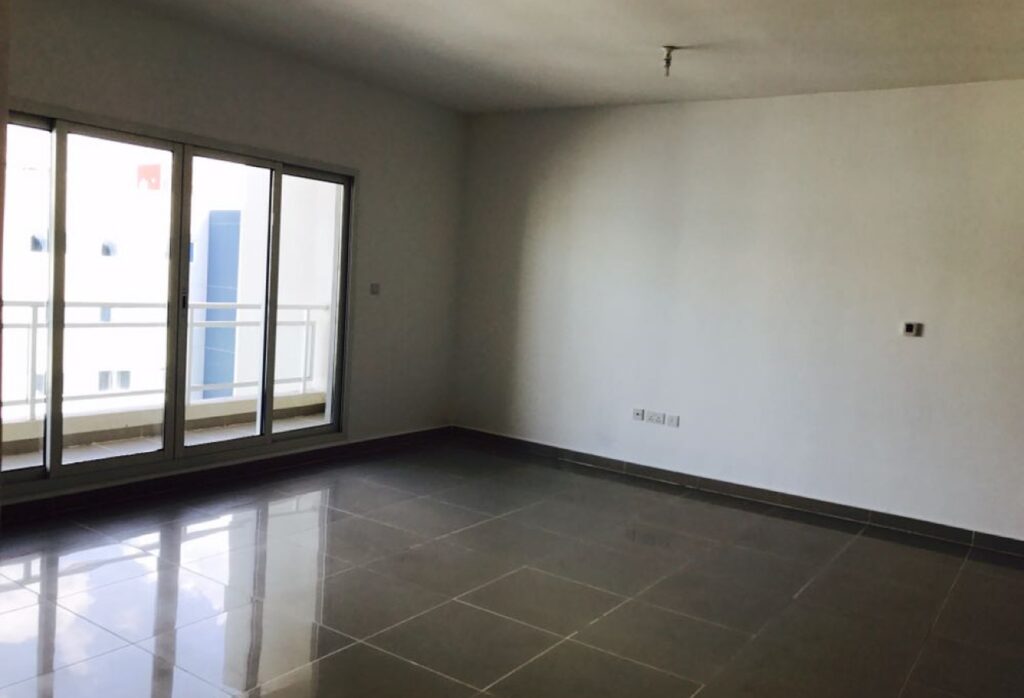 Spacious 2-bedroom apartment with balcony in Al Reef Downtown Abu Dhabi.