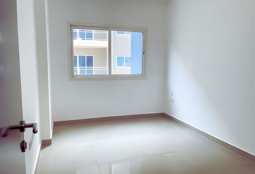 3-bedroom apartment for sale in Tower 18 Al Reef Downtown Abu Dhabi – modern family home with maid’s room and balcony