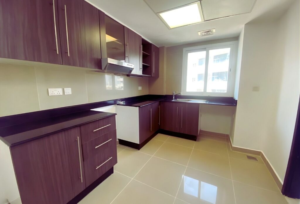 3-bedroom apartment for sale in Tower 18 Al Reef Downtown Abu Dhabi – modern family home with maid’s room and balcony