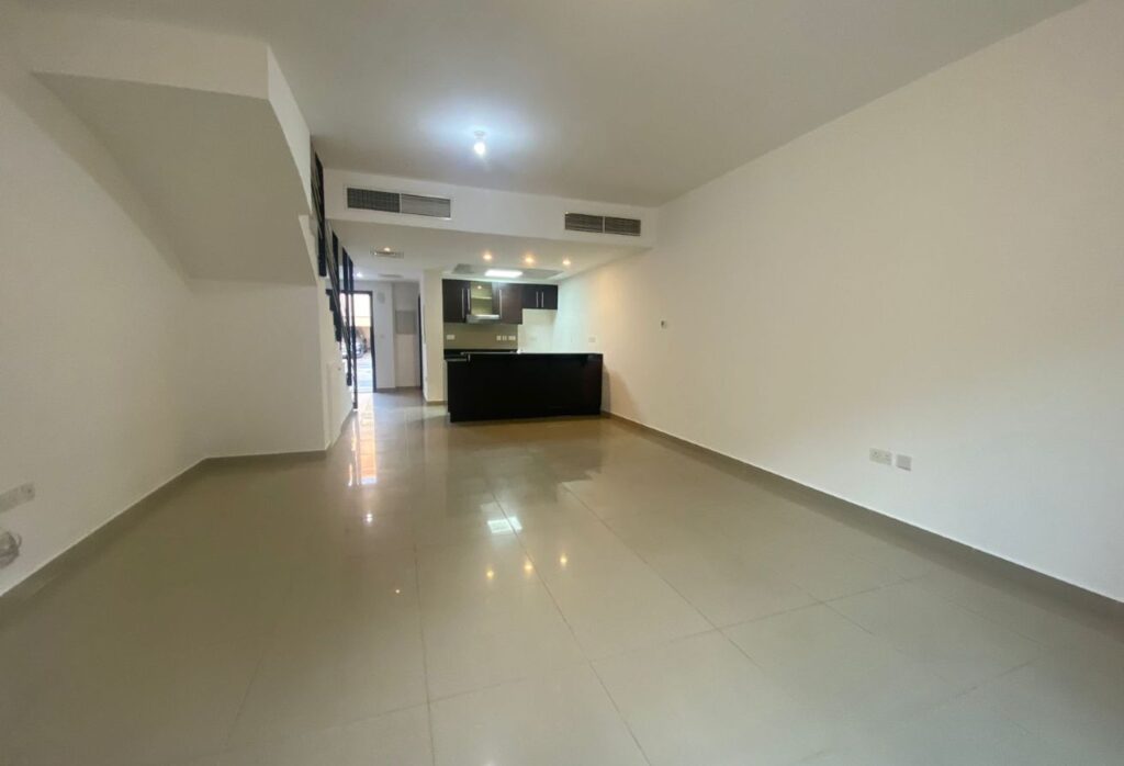 Spacious 3-bedroom villa with rooftop terrace in Al Reef Villas Abu Dhabi.