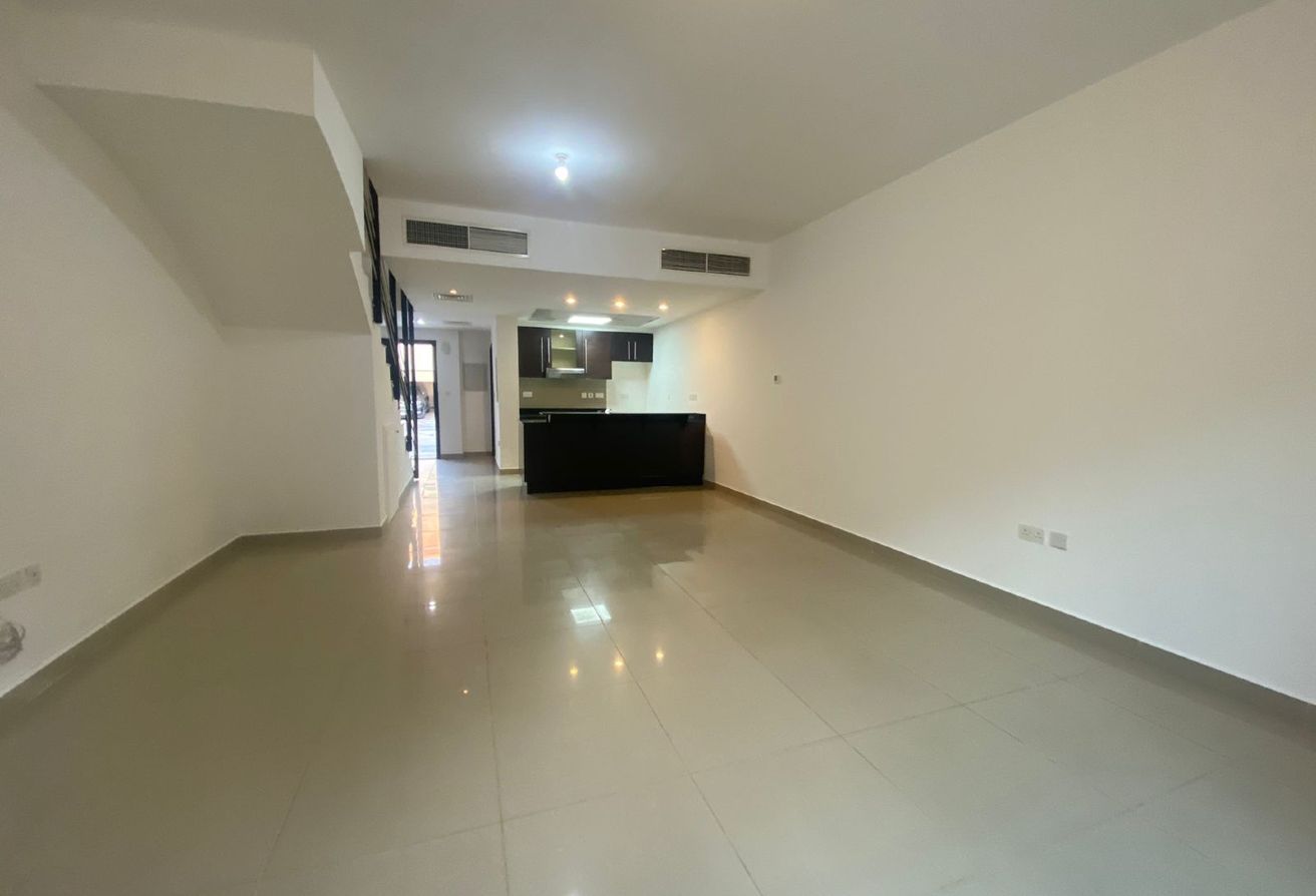 Spacious 3-bedroom villa with rooftop terrace in Al Reef Villas Abu Dhabi.