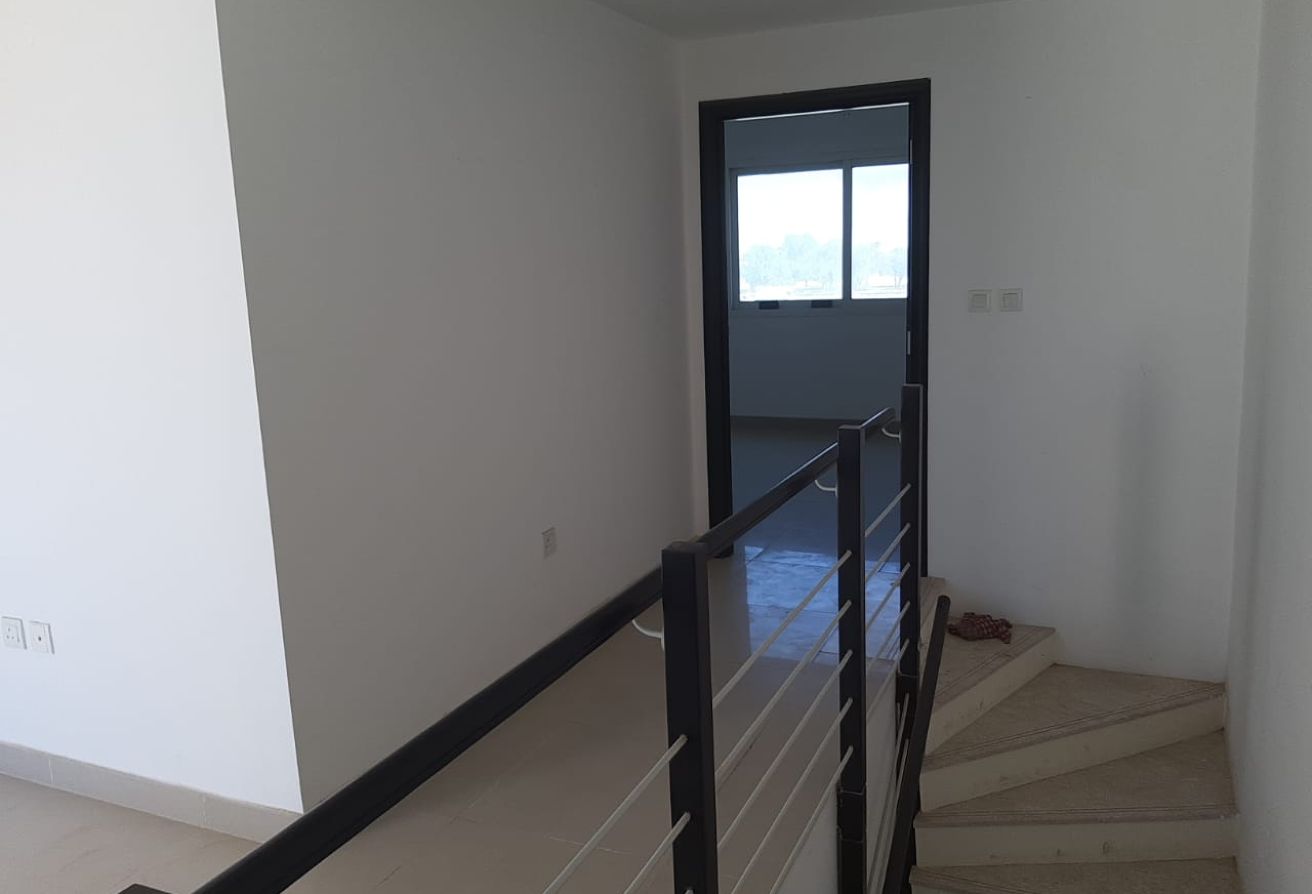 Spacious 3-bedroom villa with rooftop terrace in Al Reef Villas Abu Dhabi.