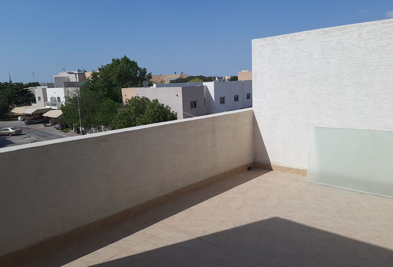 Spacious 3-bedroom villa with rooftop terrace in Al Reef Villas Abu Dhabi.