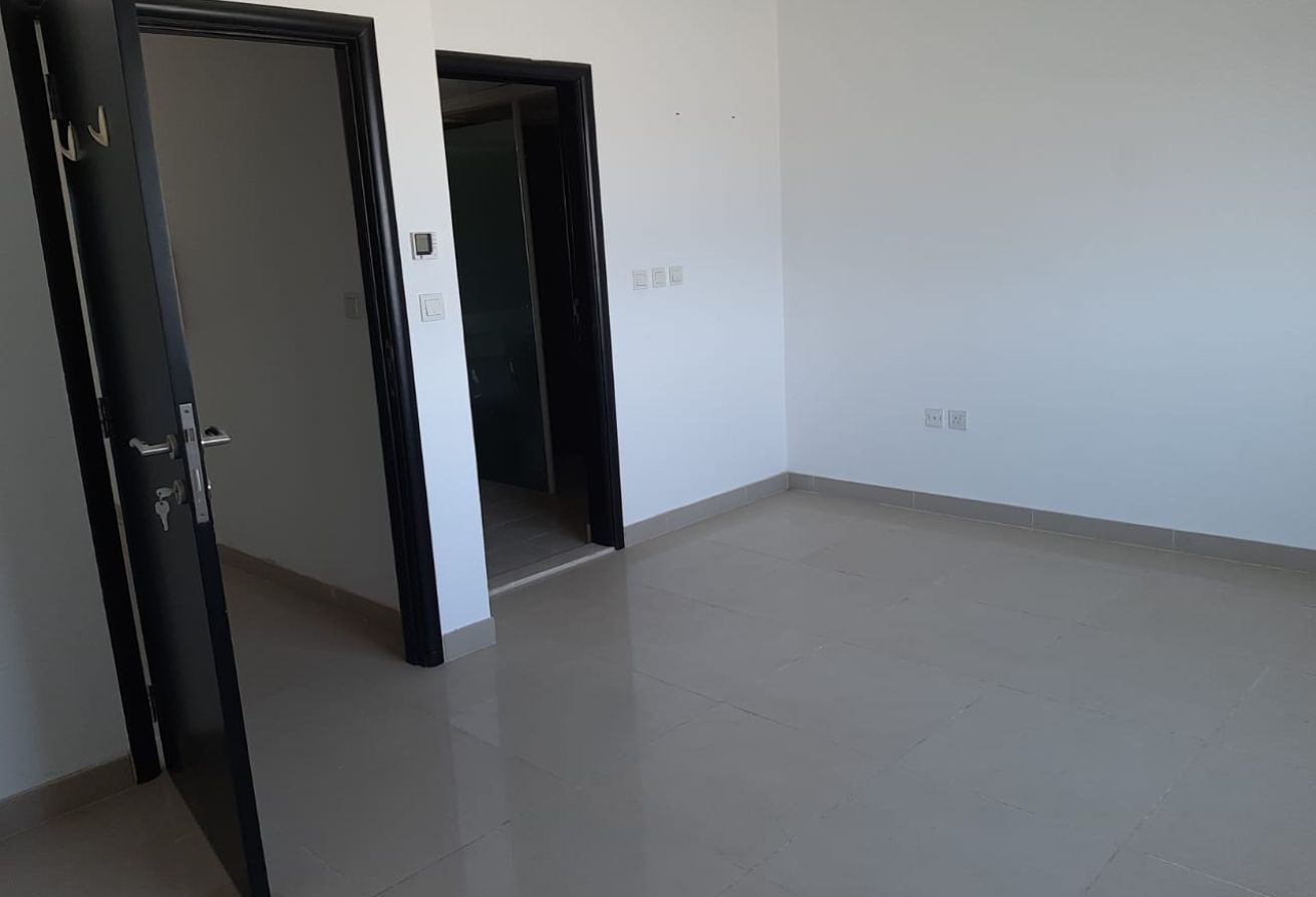 Spacious 3-bedroom villa with rooftop terrace in Al Reef Villas Abu Dhabi.