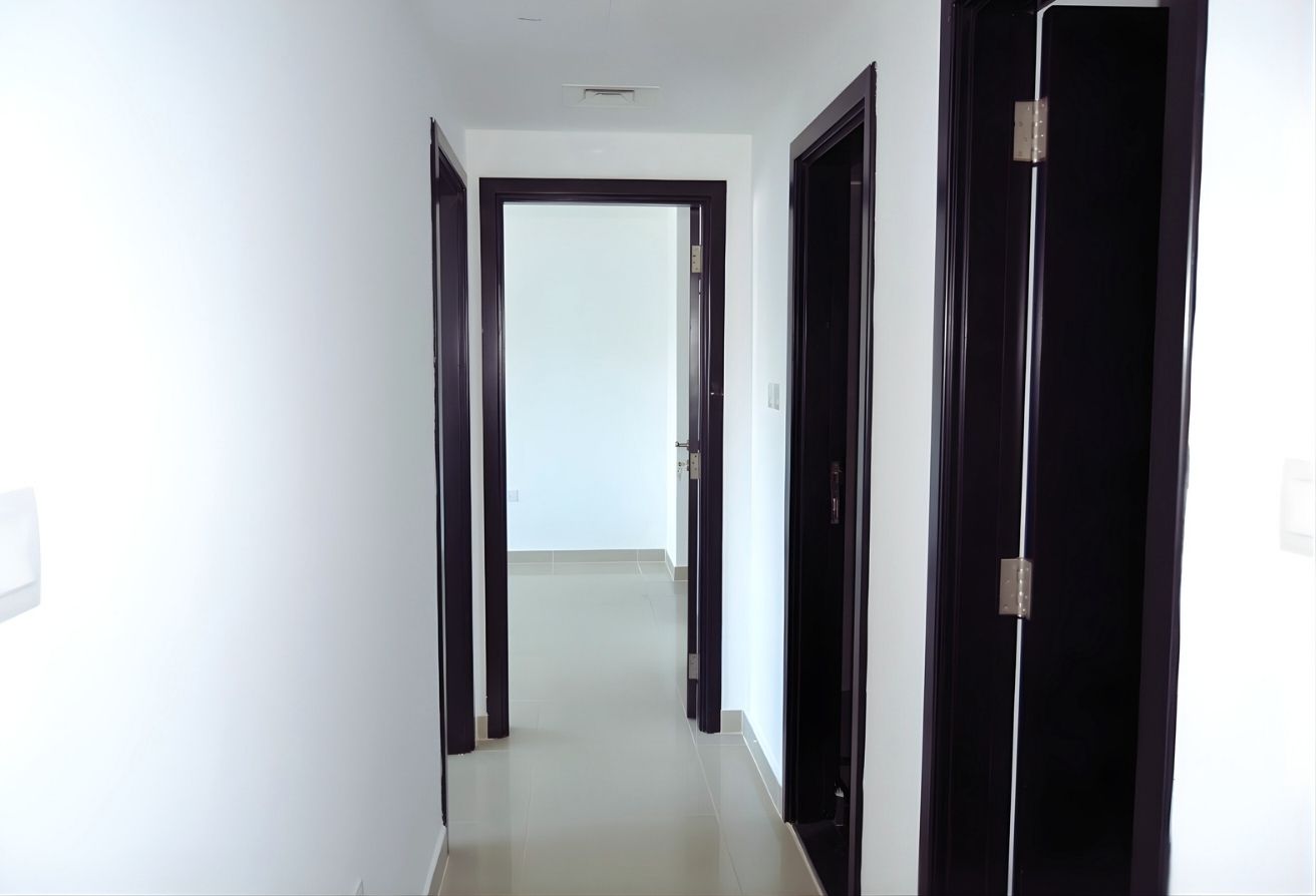 Re/Max Smart Concept 2-bedroom listing Tower 6 Al Reef Downtown Abu Dhabi.