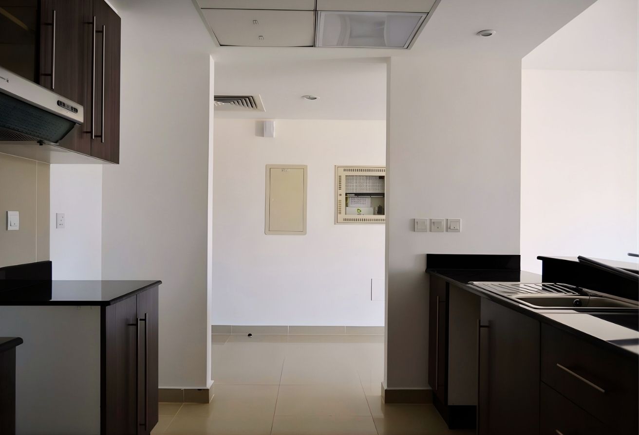 Re/Max Smart Concept 2-bedroom listing Tower 6 Al Reef Downtown Abu Dhabi.