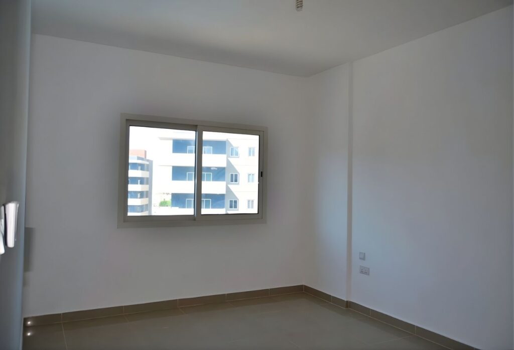 Re/Max Smart Concept 2-bedroom listing Tower 6 Al Reef Downtown Abu Dhabi.