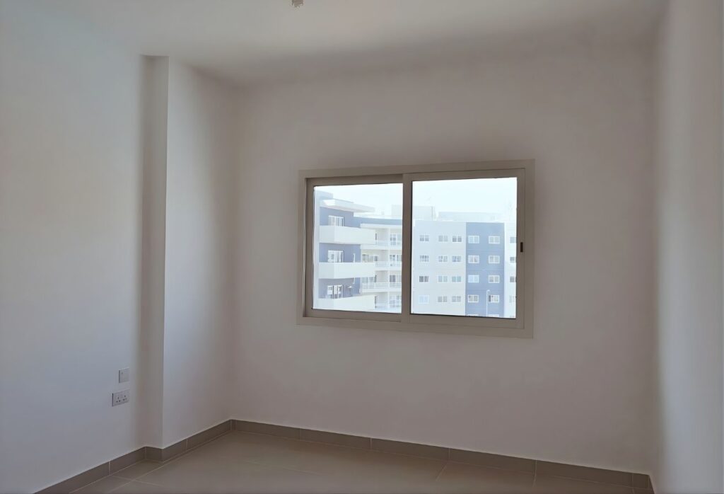Re/Max Smart Concept 2-bedroom listing Tower 6 Al Reef Downtown Abu Dhabi.