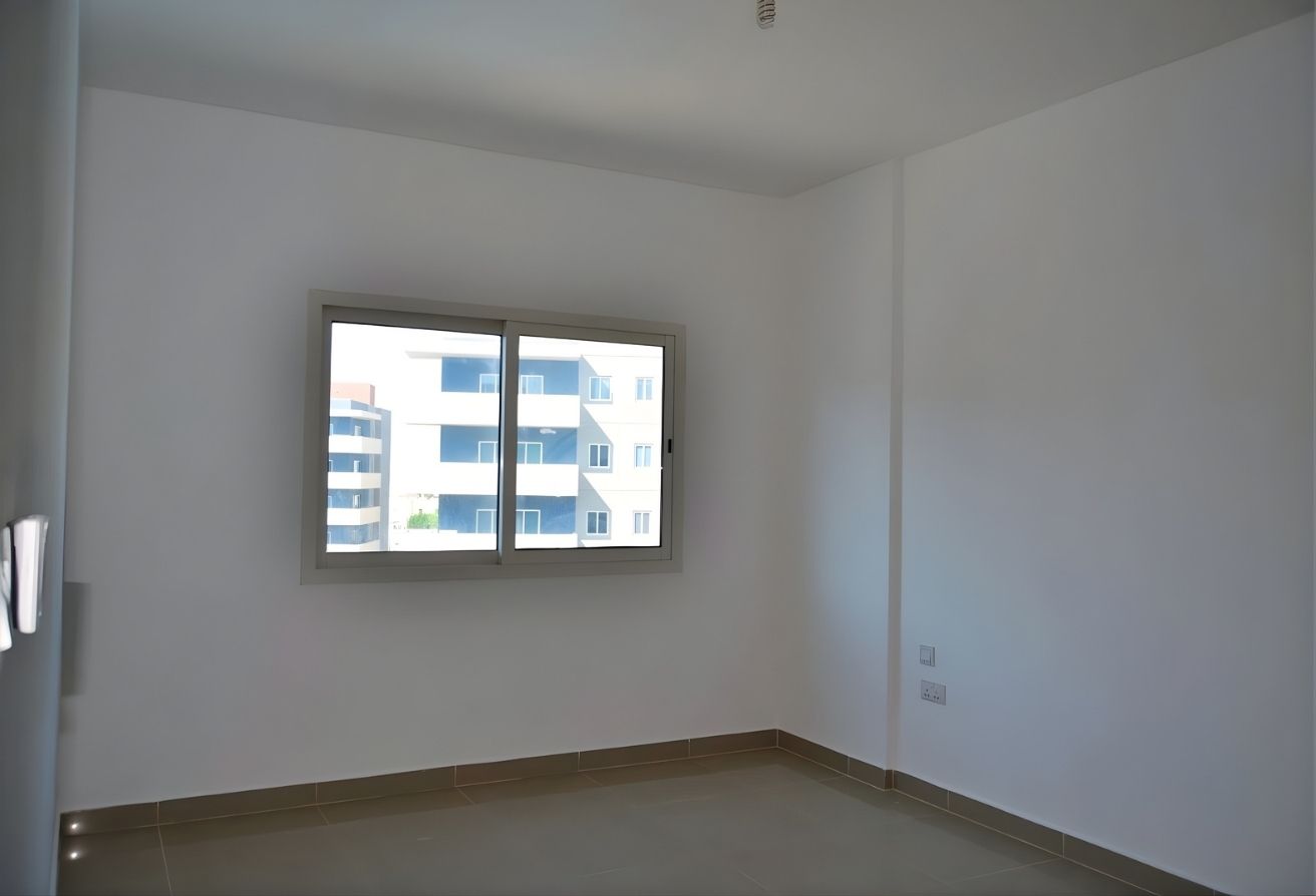 Affordable 2-bedroom rented apartment Al Reef Downtown Abu Dhabi.
