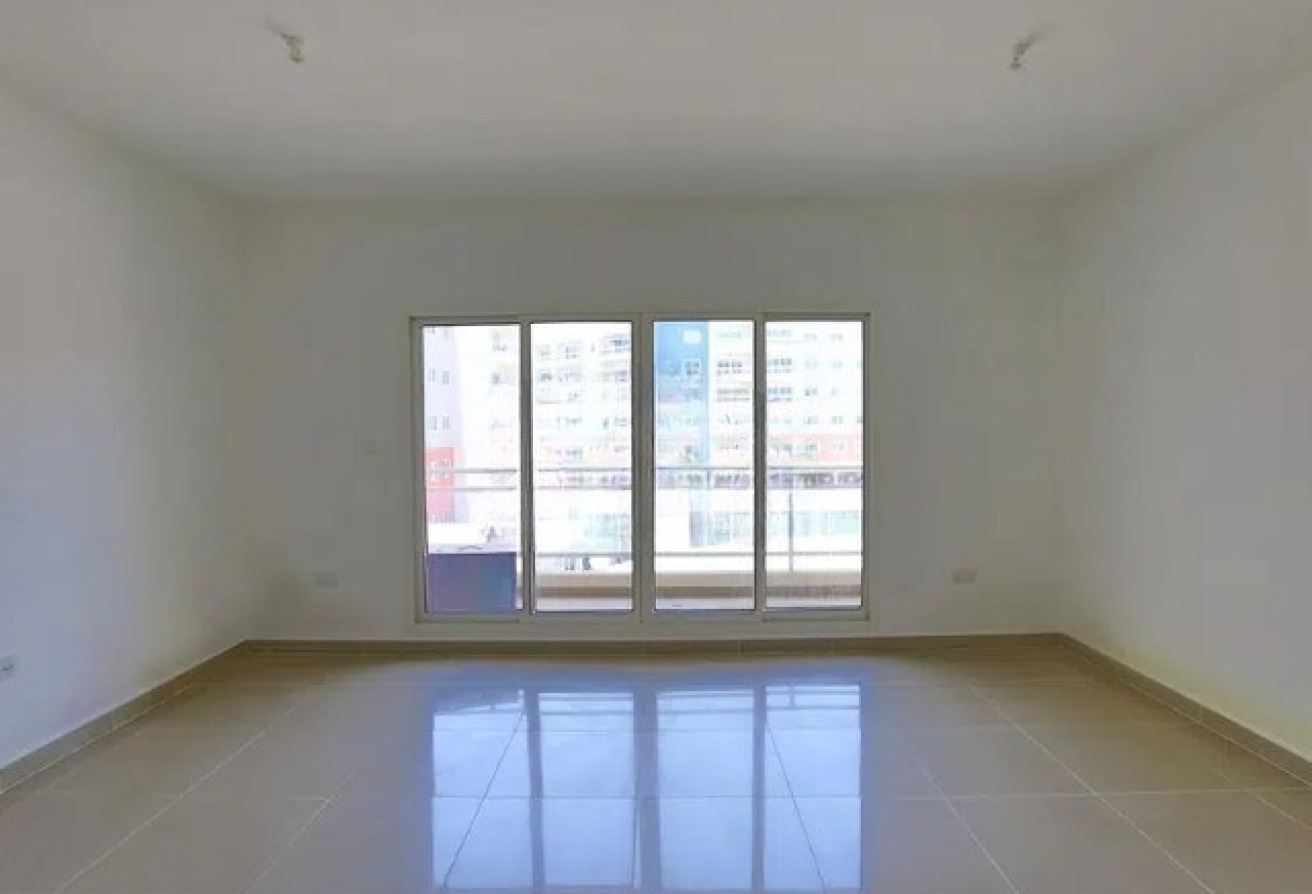 Modern 1BR apartment in Al Reef Downtown Tower 44 with balcony