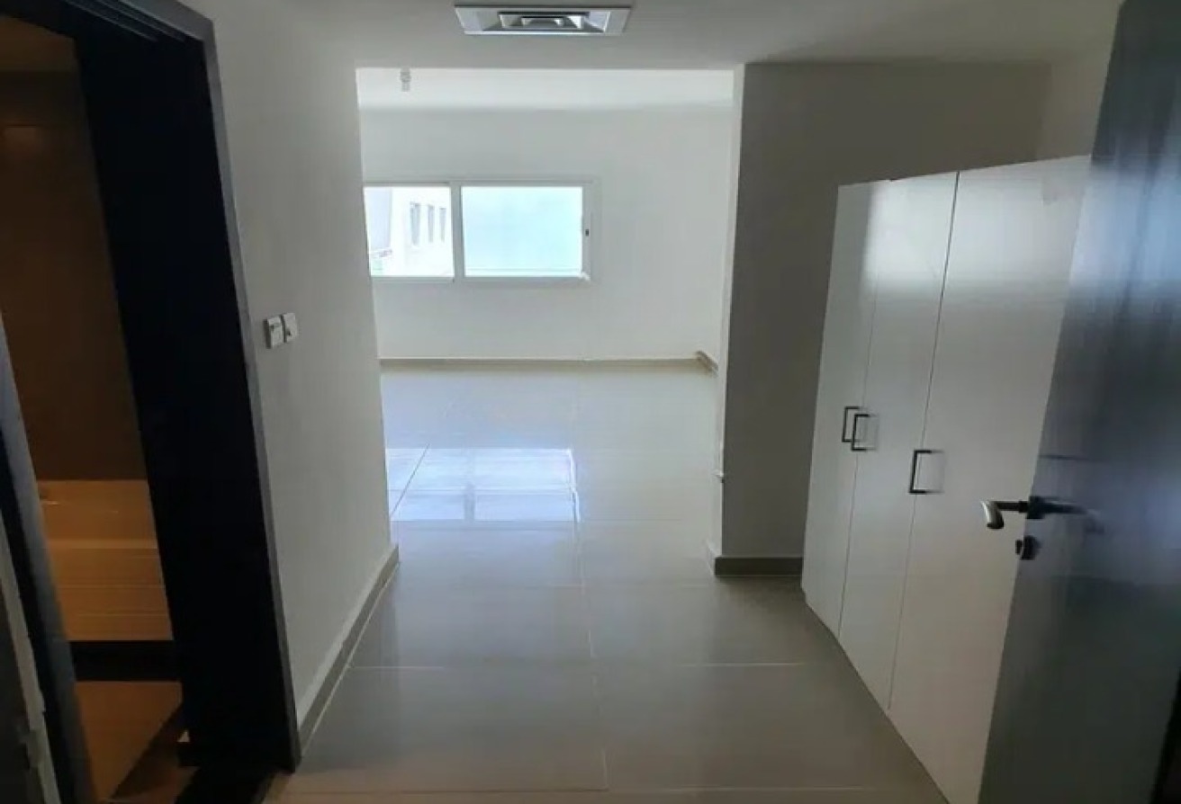 Modern 1BR apartment in Al Reef Downtown Tower 44 with balcony