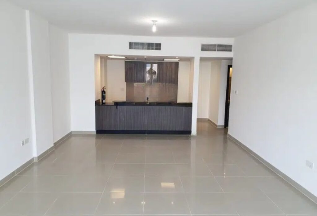 Modern 1BR apartment in Al Reef Downtown Tower 44 with balcony