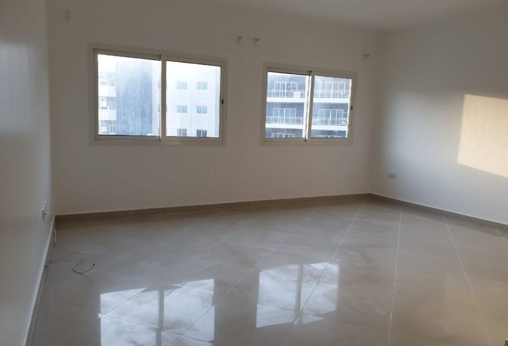 Modern 1BR apartment in Al Reef Downtown Tower 44 with balcony