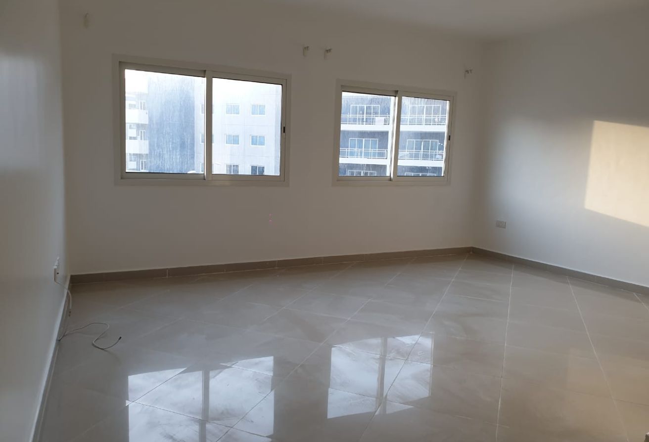 Modern 1BR apartment in Al Reef Downtown Tower 44 with balcony