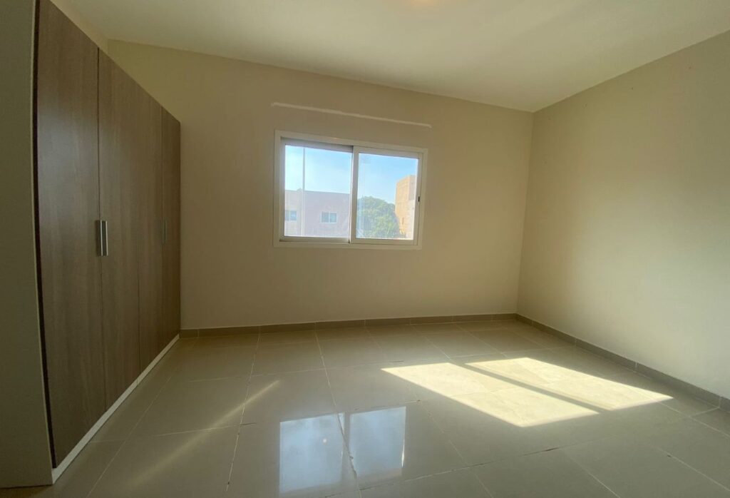 Contemporary 3BR villa with private terrace and study room in Al Reef.
