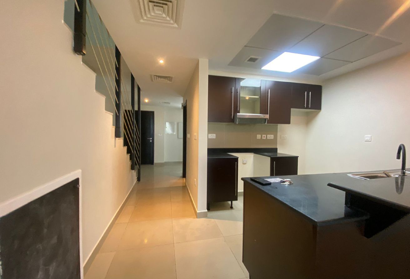 Contemporary 3BR villa with private terrace and study room in Al Reef.