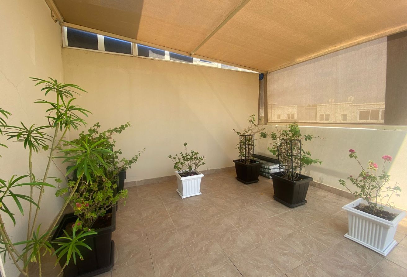 Al Reef five bedroom townhouse with rooftop terrace and garden pool.