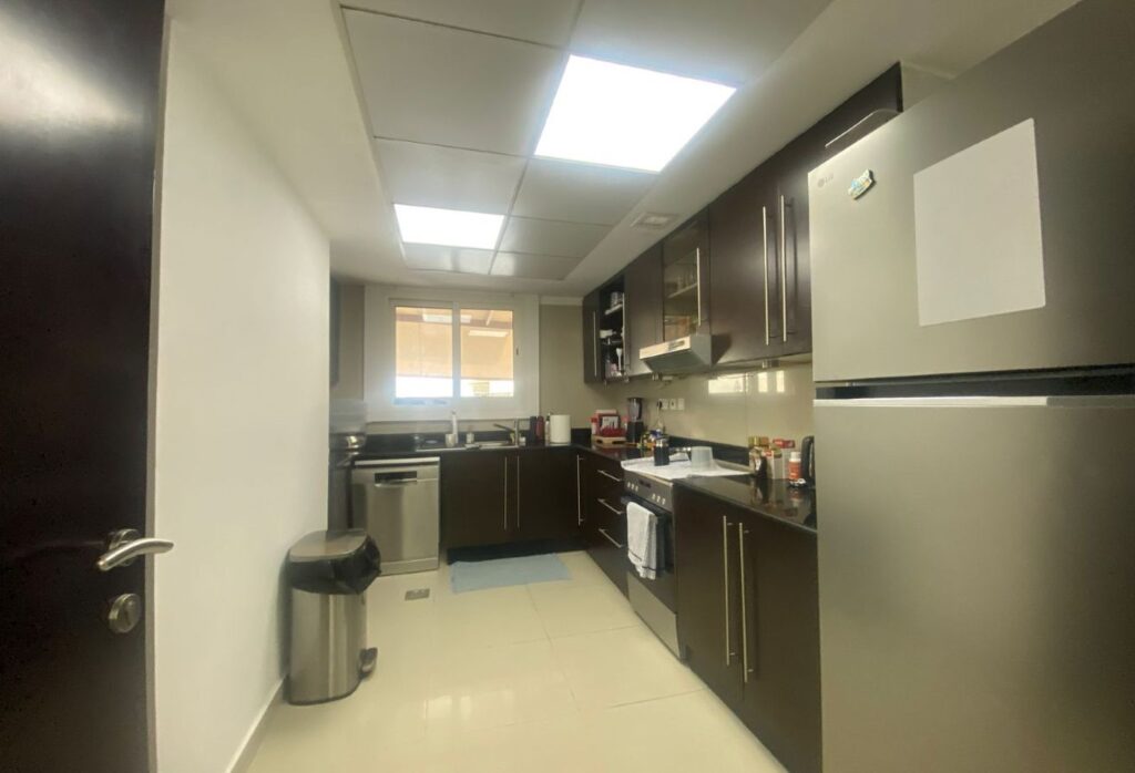 Al Reef five bedroom townhouse with rooftop terrace and garden pool.