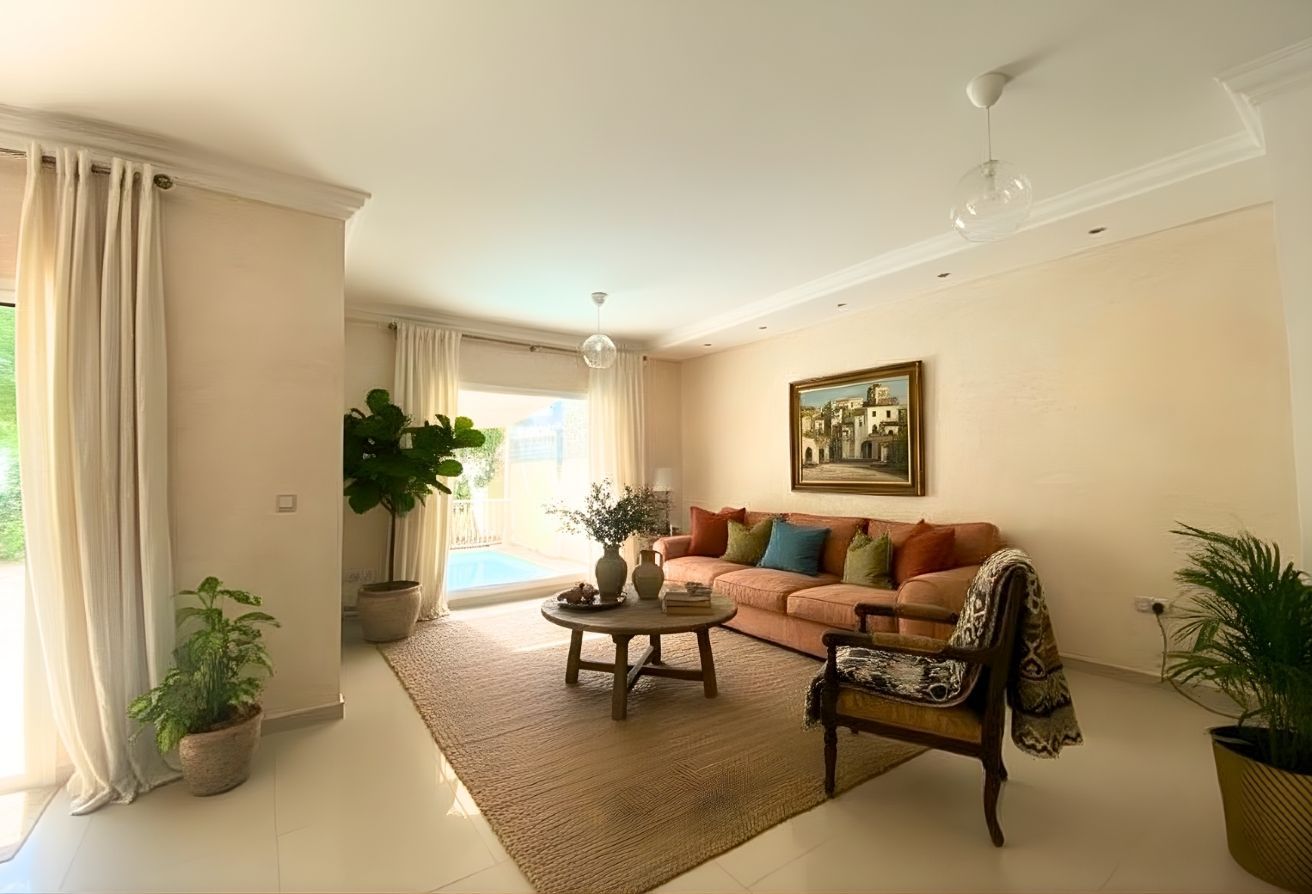 Al Reef five bedroom townhouse with rooftop terrace and garden pool.