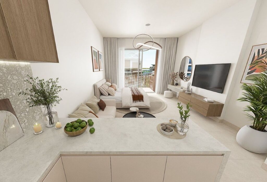 High floor studio apartment with balcony and community views in Gardenia Bay, Yas Island.