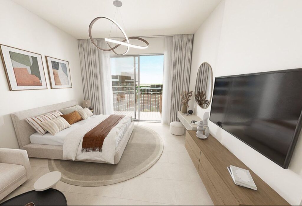 High floor studio apartment with balcony and community views in Gardenia Bay, Yas Island.