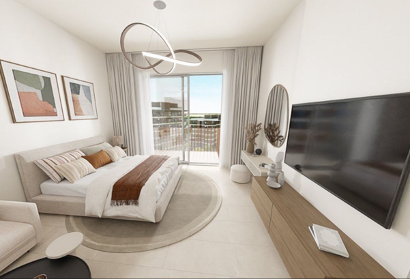 High floor studio apartment with balcony and community views in Gardenia Bay, Yas Island.