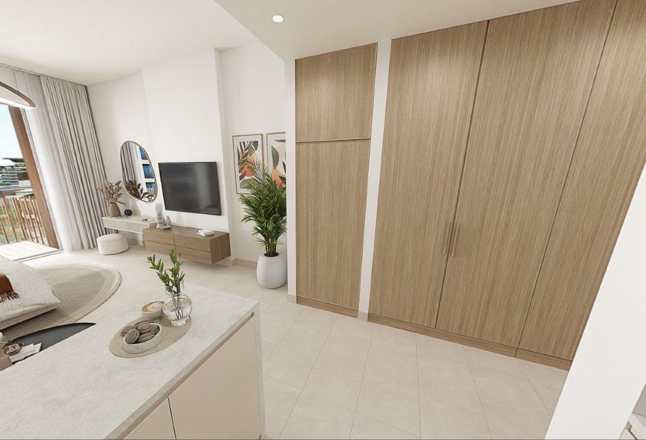 High floor studio apartment with balcony and community views in Gardenia Bay, Yas Island.