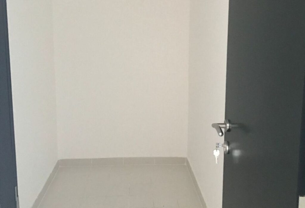 Al Reef Downtown 2 bedroom apartment balcony rent refund Abu Dhabi
