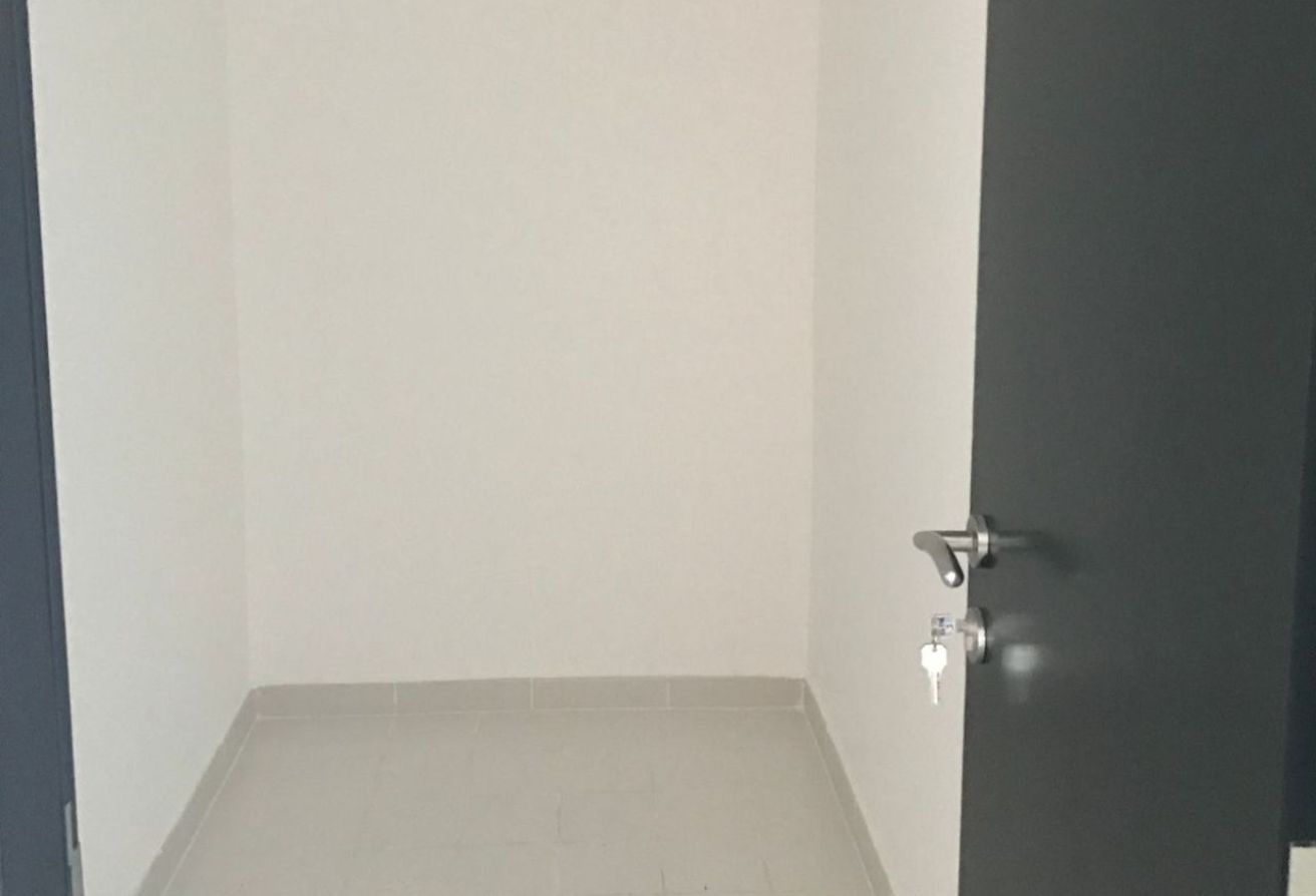 Al Reef Downtown 2 bedroom apartment balcony rent refund Abu Dhabi
