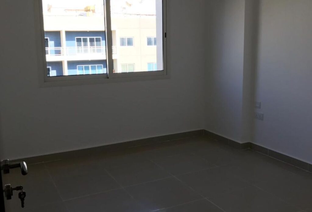 Al Reef Downtown 2 bedroom apartment balcony rent refund Abu Dhabi