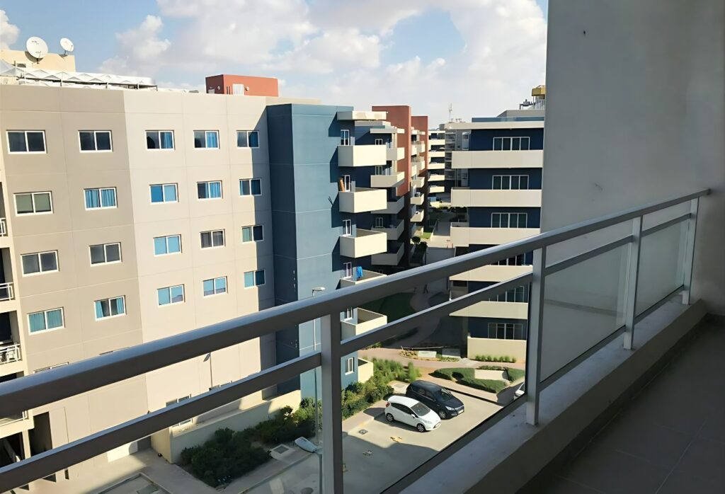 Al Reef Downtown 2 bedroom apartment balcony rent refund Abu Dhabi