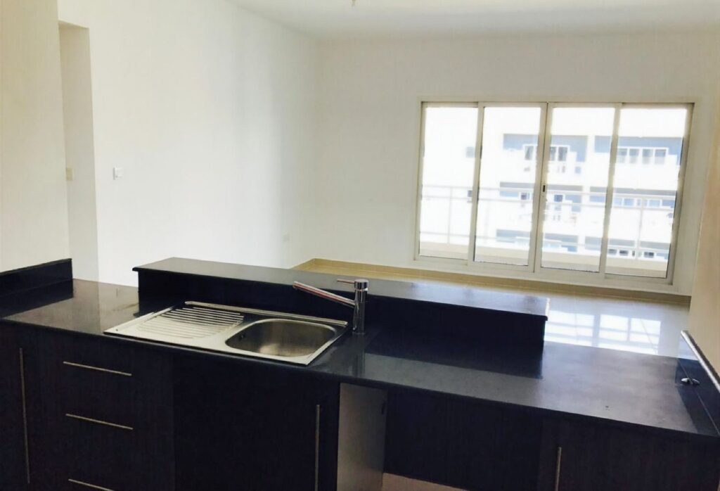 Al Reef Downtown 2 bedroom apartment balcony rent refund Abu Dhabi