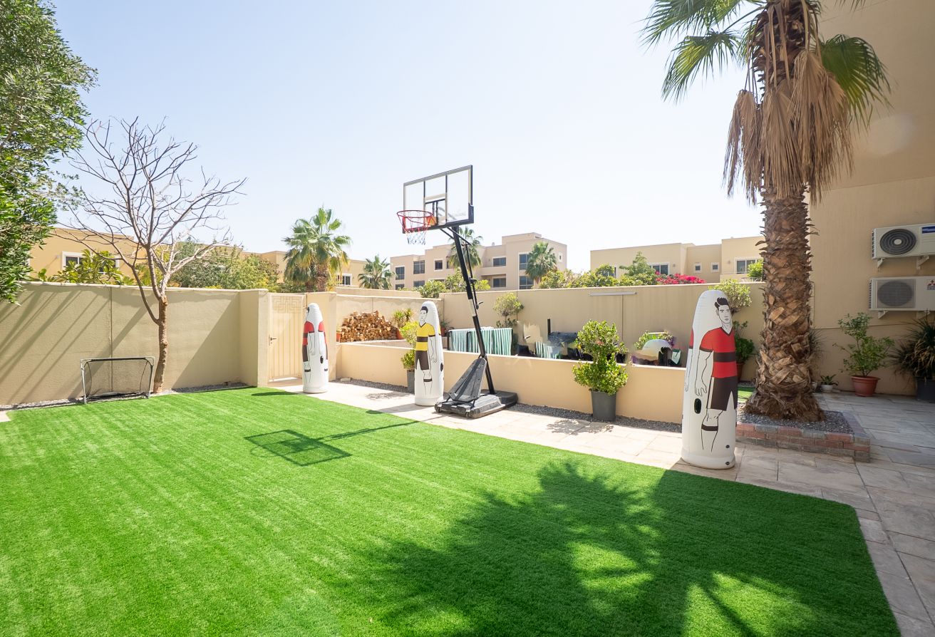 Qattouf Community townhouse Al Raha Gardens private garden