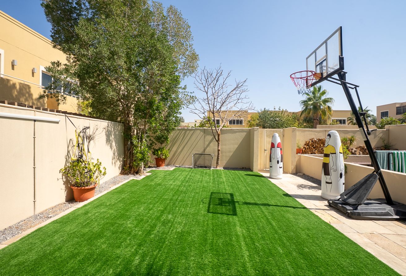 Qattouf Community townhouse Al Raha Gardens private garden