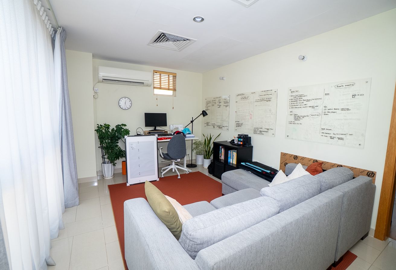 Qattouf Community townhouse Al Raha Gardens private garden