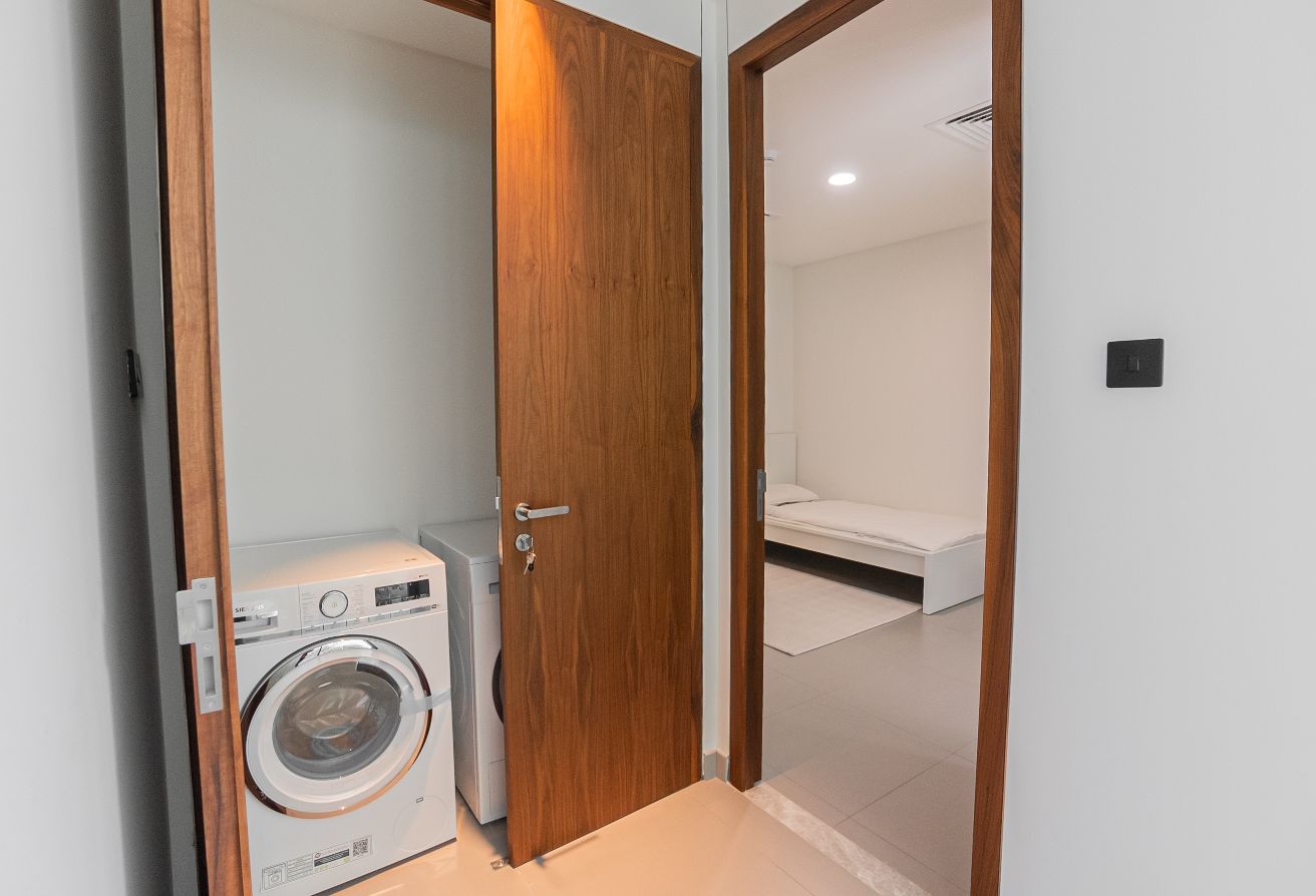 Modern villa with garden and private patio in gated Saadiyat Lagoons community