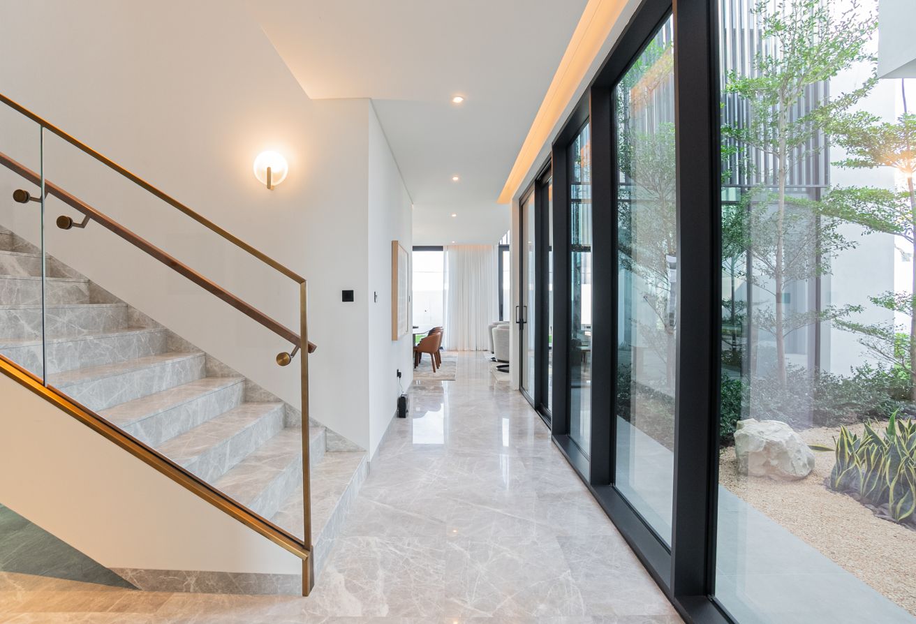 Modern villa with garden and private patio in gated Saadiyat Lagoons community