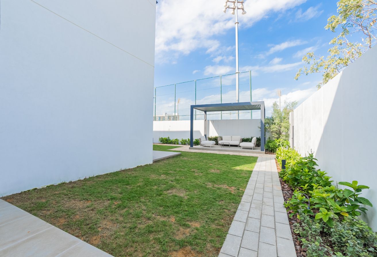 Modern villa with garden and private patio in gated Saadiyat Lagoons community